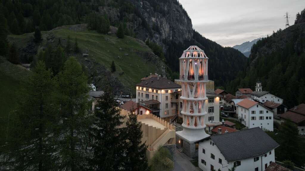 photograph of tor alva nestled in the mountainous landscape of mulegns, switzerland