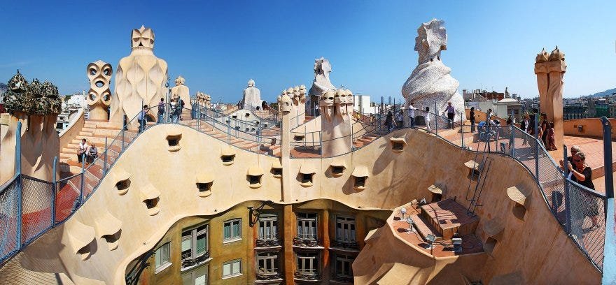  casa milà's rooftop, with its sculptural chimneys and ventilation towers that resemble surreal, humanoid figures
