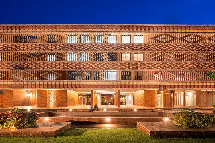 front view of a brick and terracotta facade of a building 
