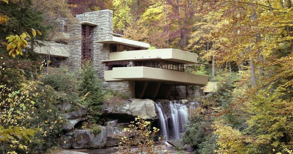 fallingwater rests gently over a flowing stream - frank lloyd wright foundation